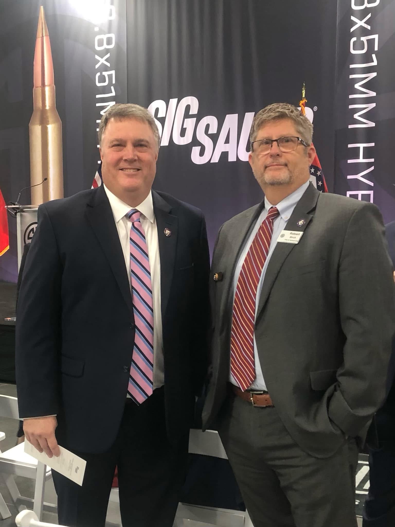 Mayor Elmore with Robert Birch, Director of Economic Development, City of Jacksonville, at a SIG Sauer event.